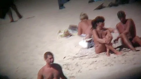 Only on a nudist beach can a voyeur find some good chicks