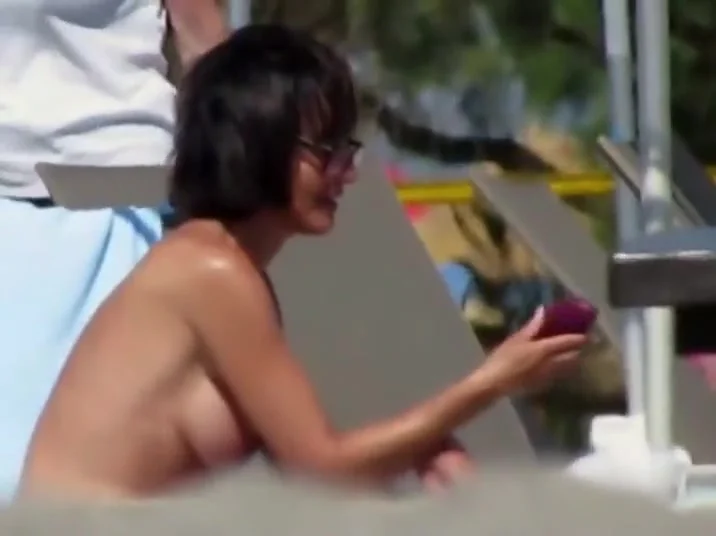 Adorable topless babe with big tits