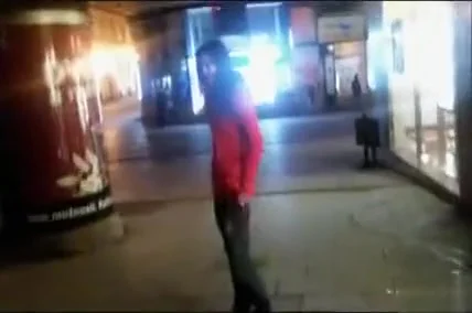 cutie pissing on a public sidewalk