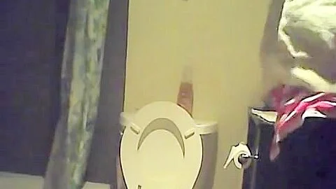 Hidden piss cam in the home toilet shows peeing sister