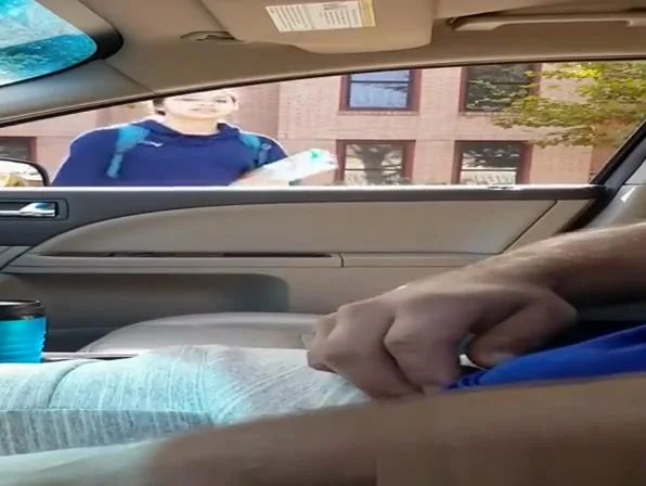 Guy plays with his dick inside car
