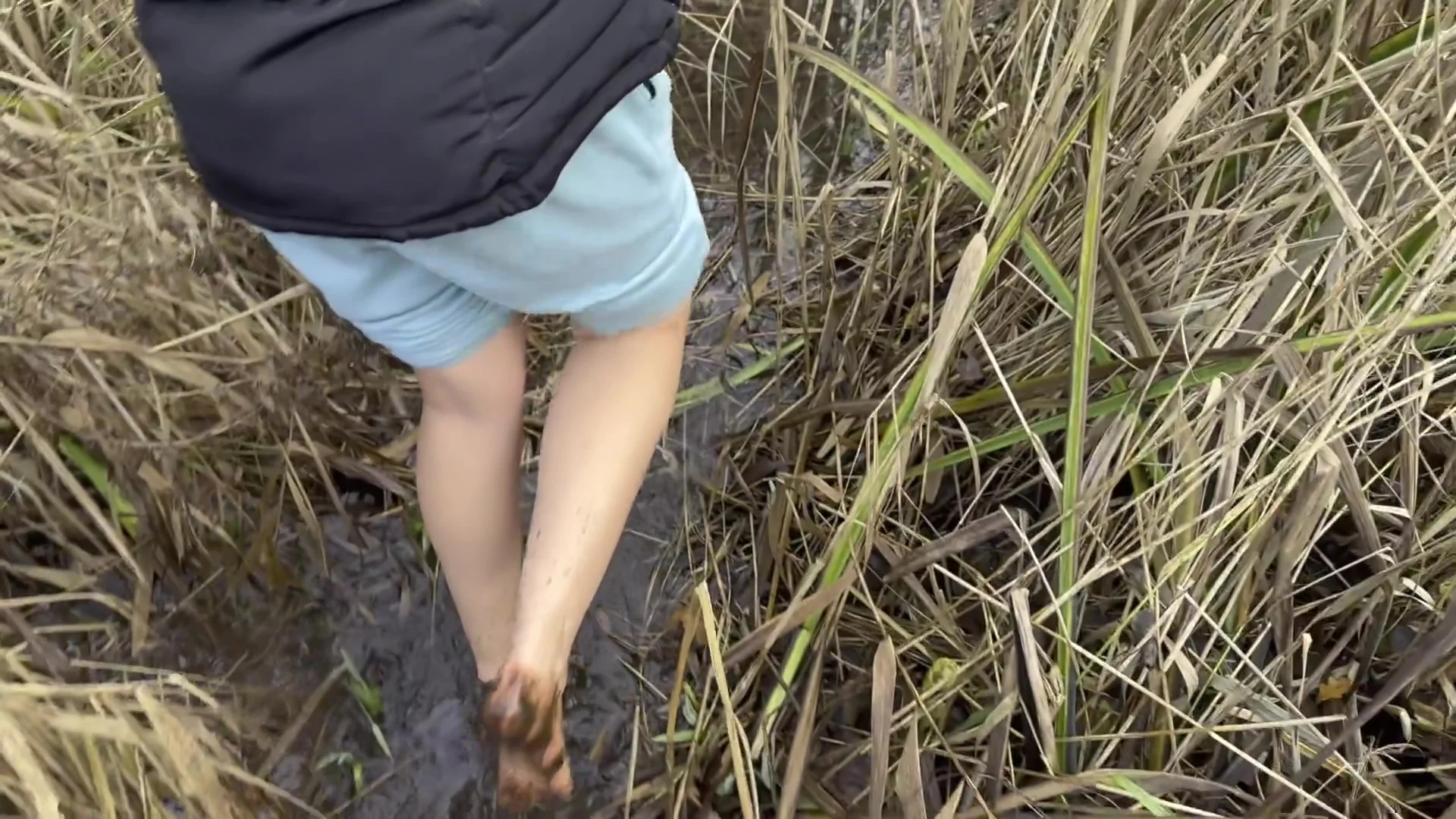 Walking Barefoot In A Swampy Bog - Muddy Feet