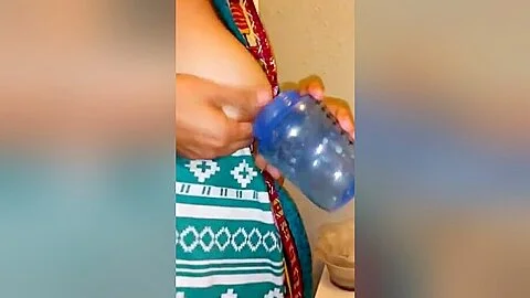 Mexican girl milking her tits