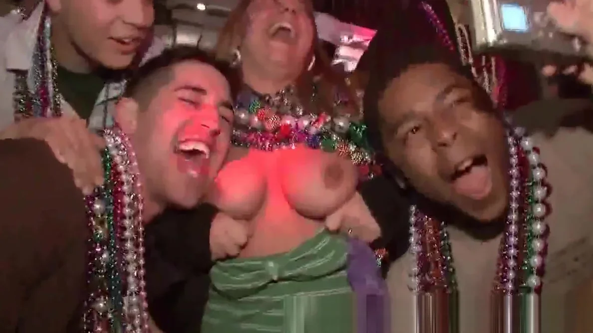 Group of hot babes showing their tits at Mardi Gras