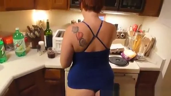 Big booty wife cooking in thong