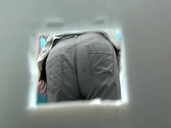 Chubby ass takes a pee in portable toilet