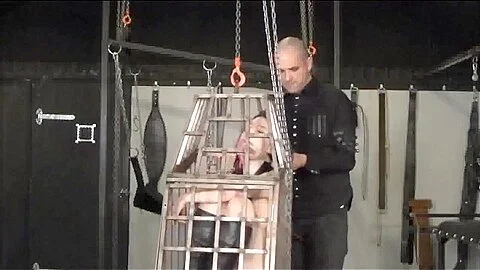 Amateur slavegirl in a cage