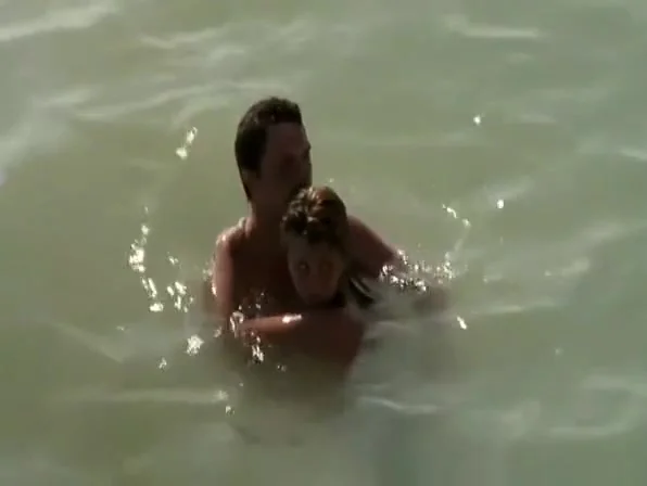 Nudist couple caught fucking in the water
