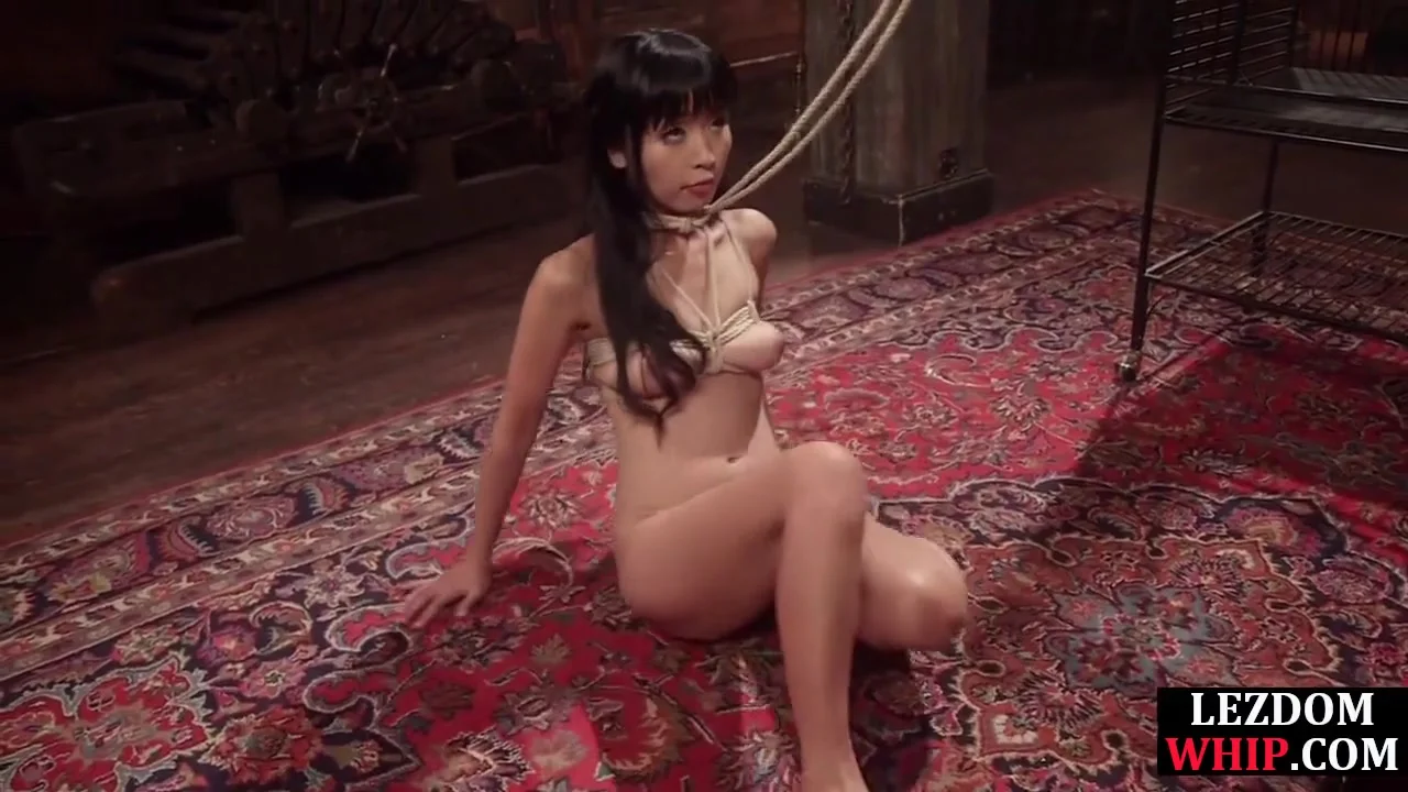 Whipping busty lezdom fucks Asian sub with strapon