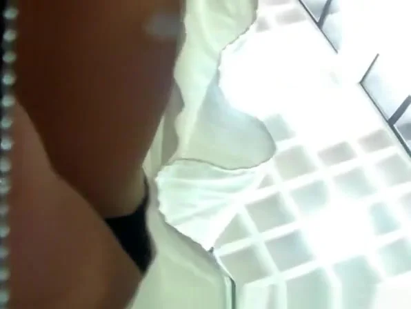 Upskirt films woman's black panties