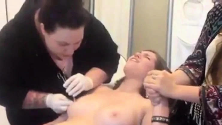 Young Girl gets Nipples Pierced