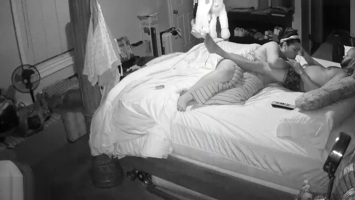wife and husband a bed