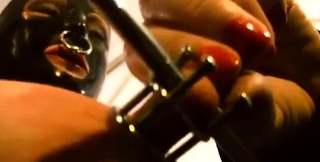 Slave M nipple stretching