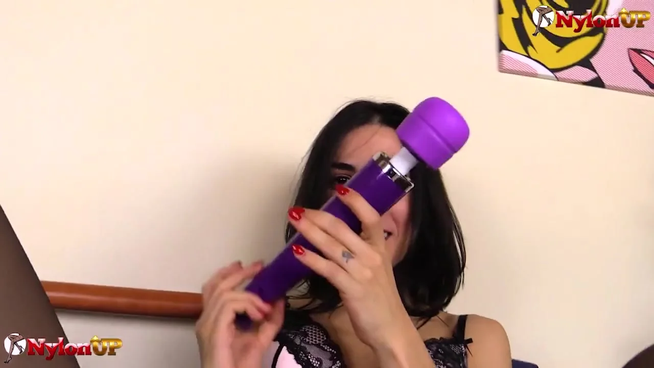 Magena Yama masturbates with a sex toy while in pantyhose