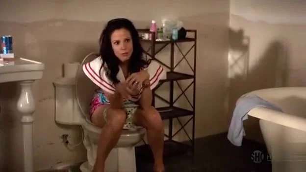 Mary Louise Parker on the toilet