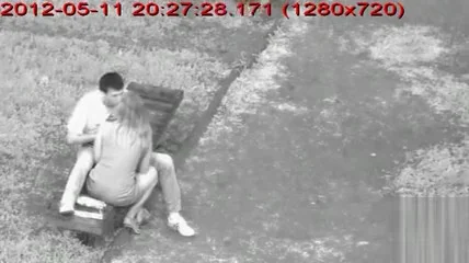 Blonde amateur girl gives her horny guy a nice handjob in the park