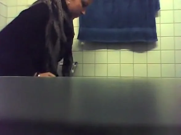 Blonde Peeing in Bathroom