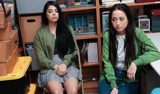 Two young brunettes undressed in front of the guy in the office to eng...