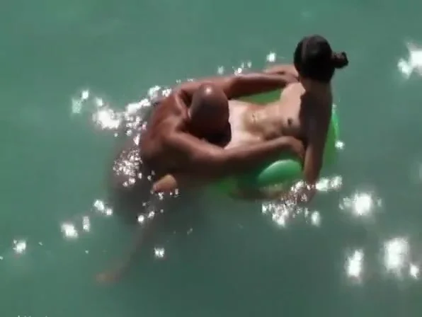 Nudist woman pussy eaten in the water