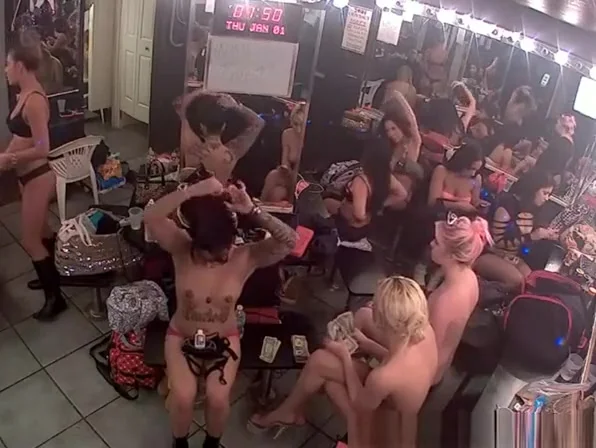Strippers in change room counting money