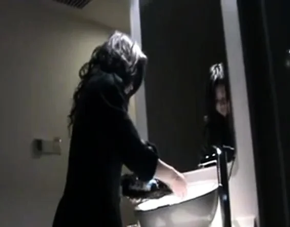 Asian Girl Uses a Bottle to Masturbate