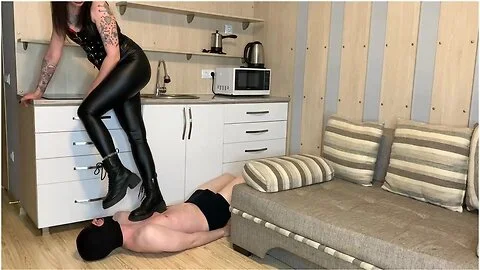 Dominatrix Nika Becomes In Dirty Boots On The Chest And Face Of A Slave