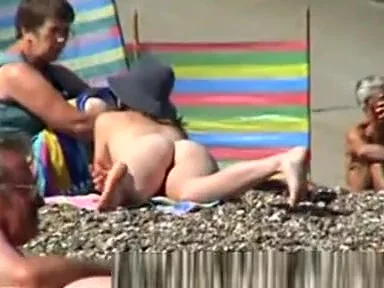VoyeurCAM Sexy Brunette sunbathing nude