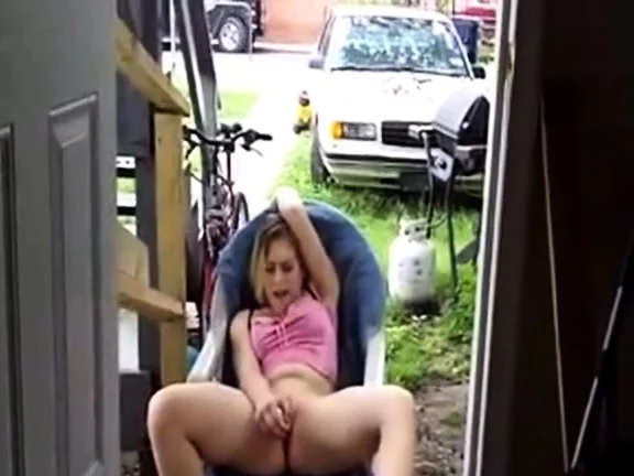 Girl masturbates outside the house