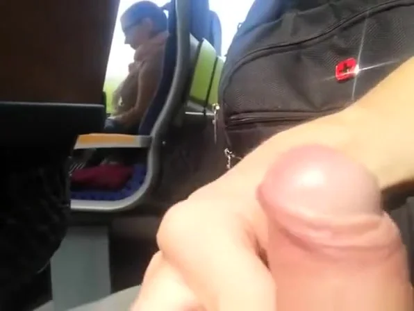 Dude takes out is cock in train and plays with it