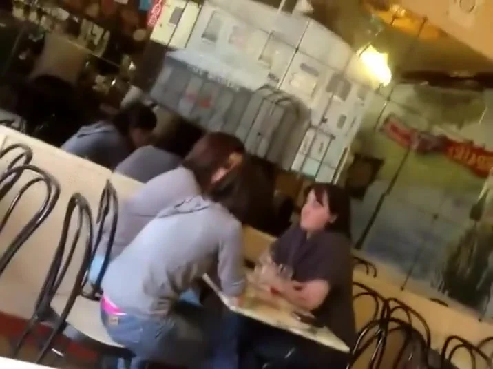 Cute girl's thong is out at a coffee place