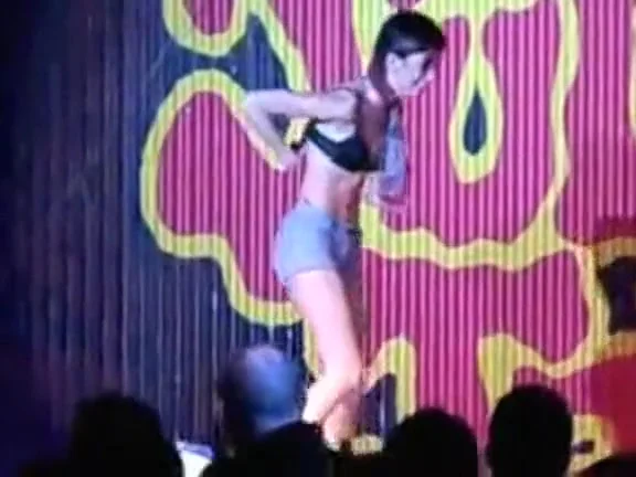 Striptease on a balance board for a game show