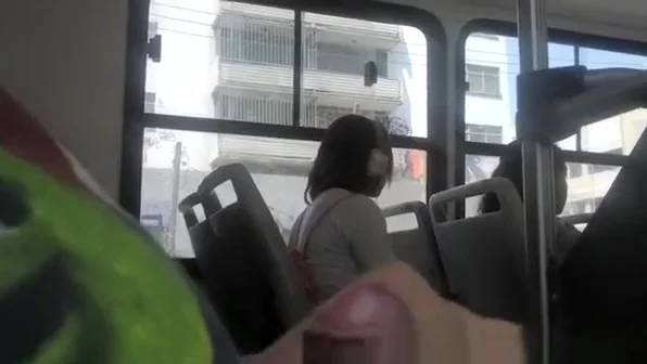 Dude plays with dick in bus