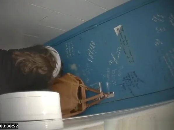 Hovering the toilet pissing in public toilet