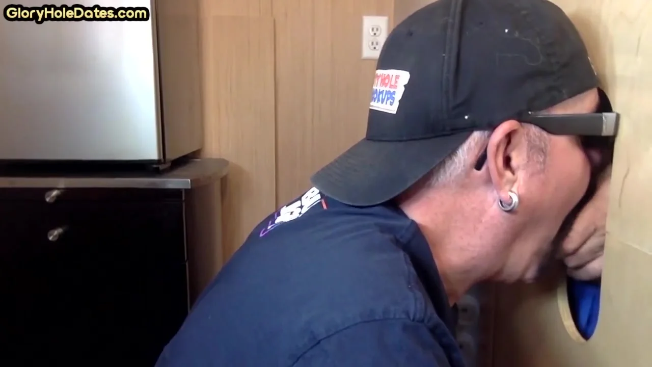 Gloryhole gay enjoys jerking big dick while sucking it