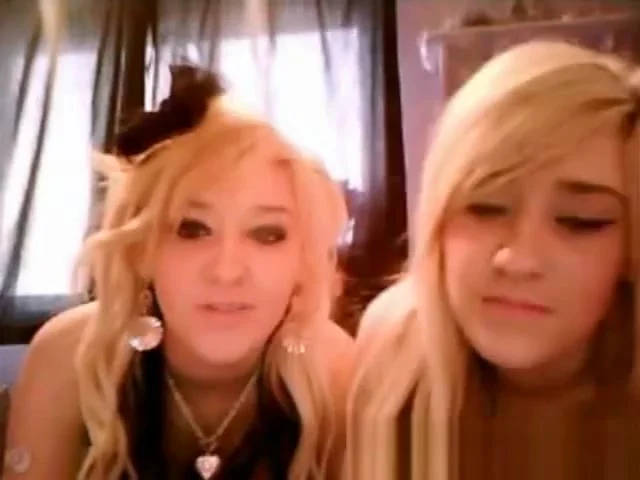 Two Hot Blonde Lesbians Play With Each Other On Cam