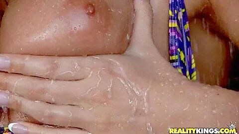 Lisa Sparkle and Ramon Nomar relax in a shower