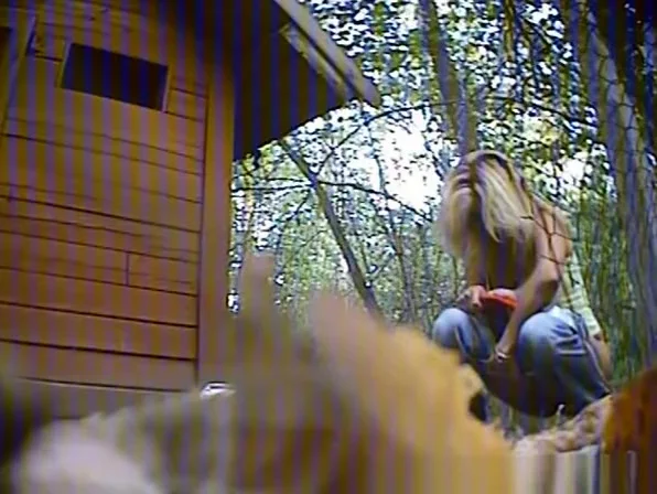 Blonde woman with sexy ass spied pissing outdoors