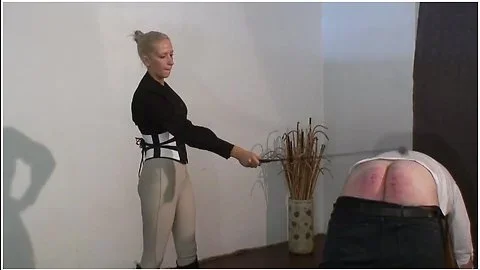 slave gets caned by strict blonde mistress