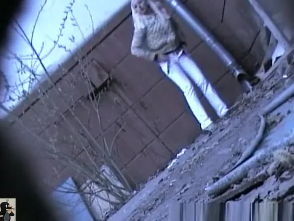 Blonde girl pees outside