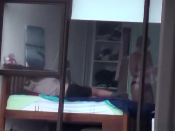Mature spied through the hotel bedroom window