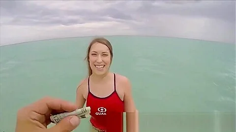 Naughty Beach Guard Sucks Strangers Penis For Cash