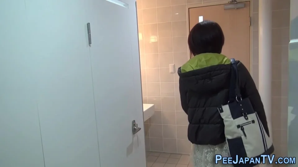 Filmed Asian Urinating