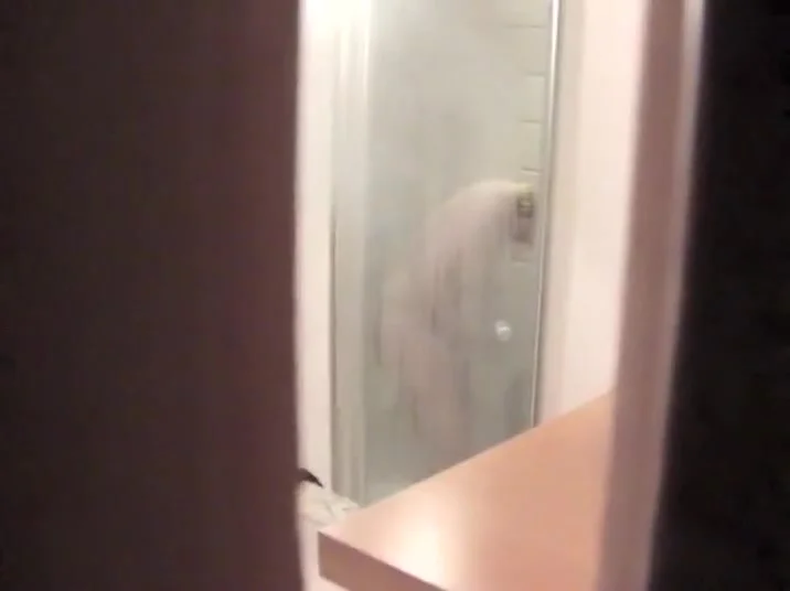 Girl shaves her pussy in the shower