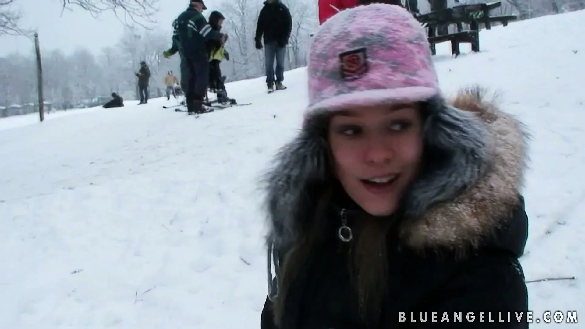 Hot teen has fun playing out in the cold snow with her cameraman