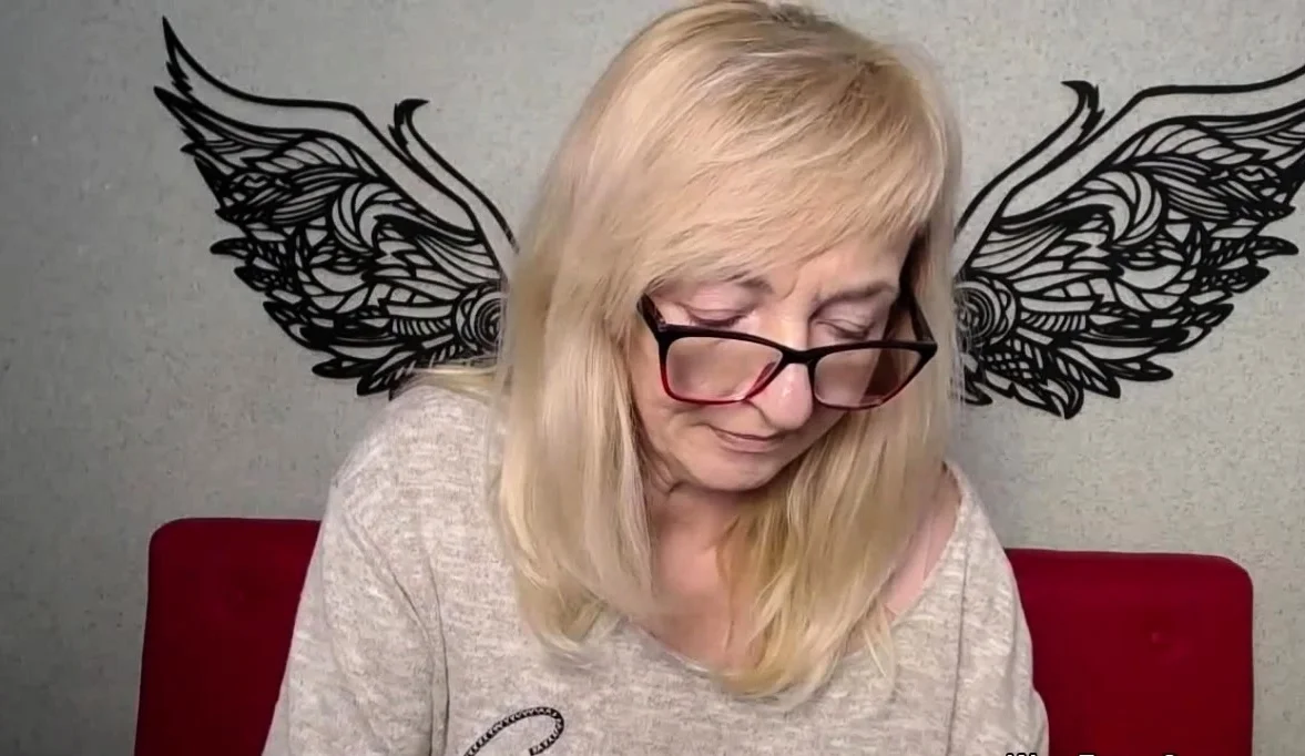 Blonde amateur MILF with glasses chatting on webcam show