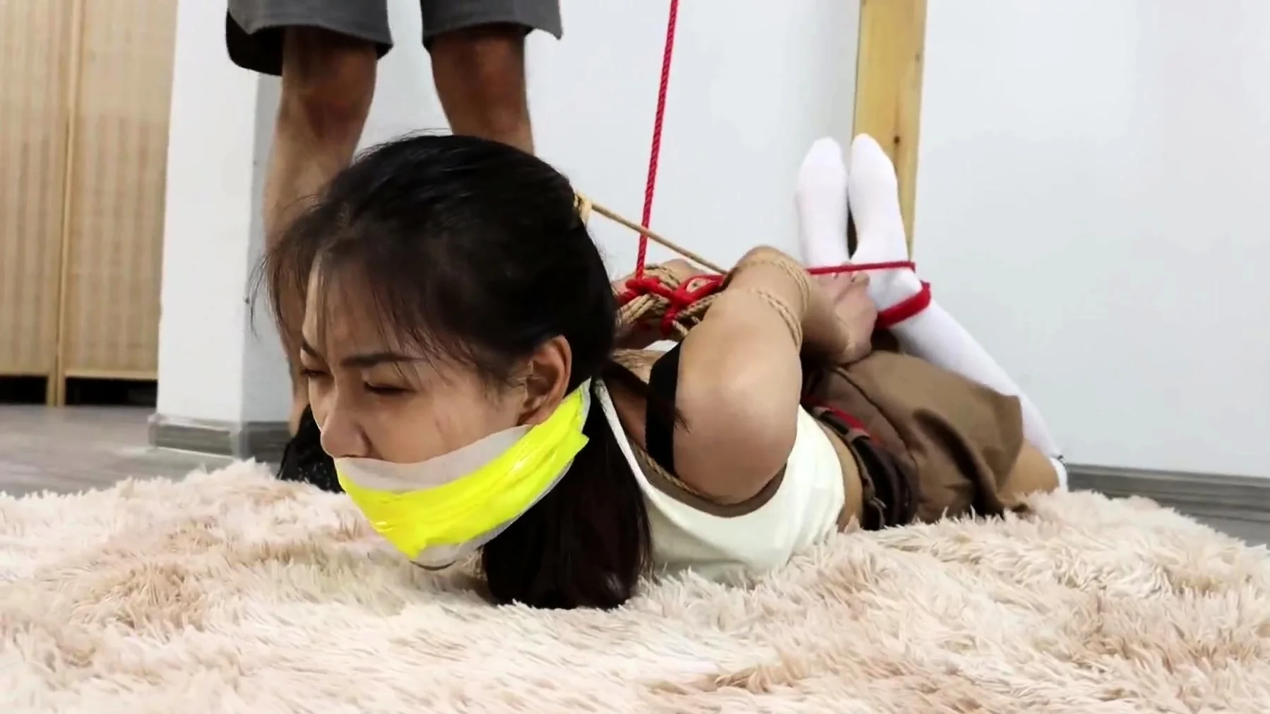 Chinese bondage - Hogtied & gagged in boots