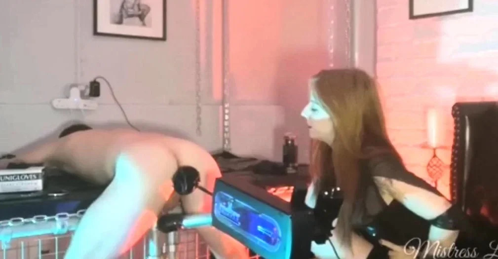 Femdom loving redhead uses strapon