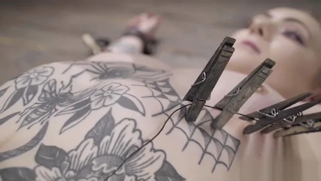 Alt blonde in extreme device bondage