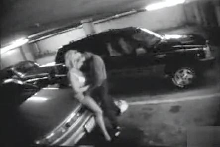 Parking garage sex on security camera with a charming blonde