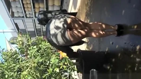 Exhibitionist woman in garden store